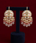 White and pink meenakari tikka and earrings